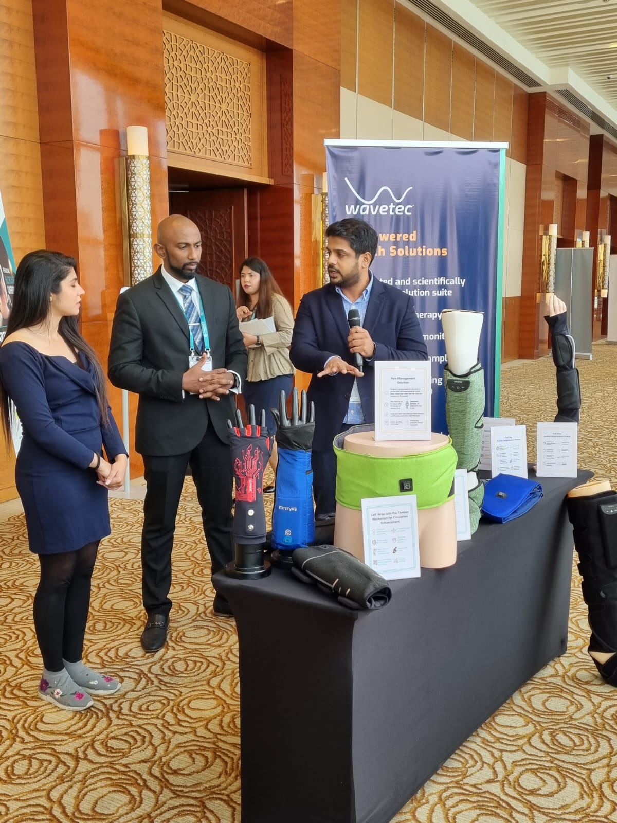 Dr. Angelo presenting Wavetec compression therapy products