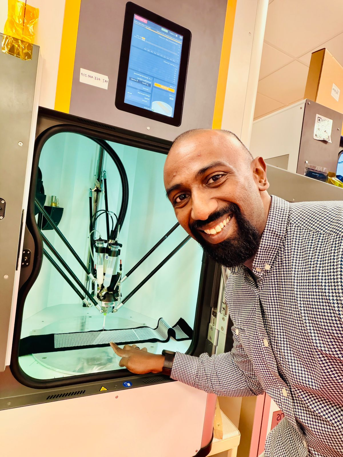Dr. Angelo with bioprinter